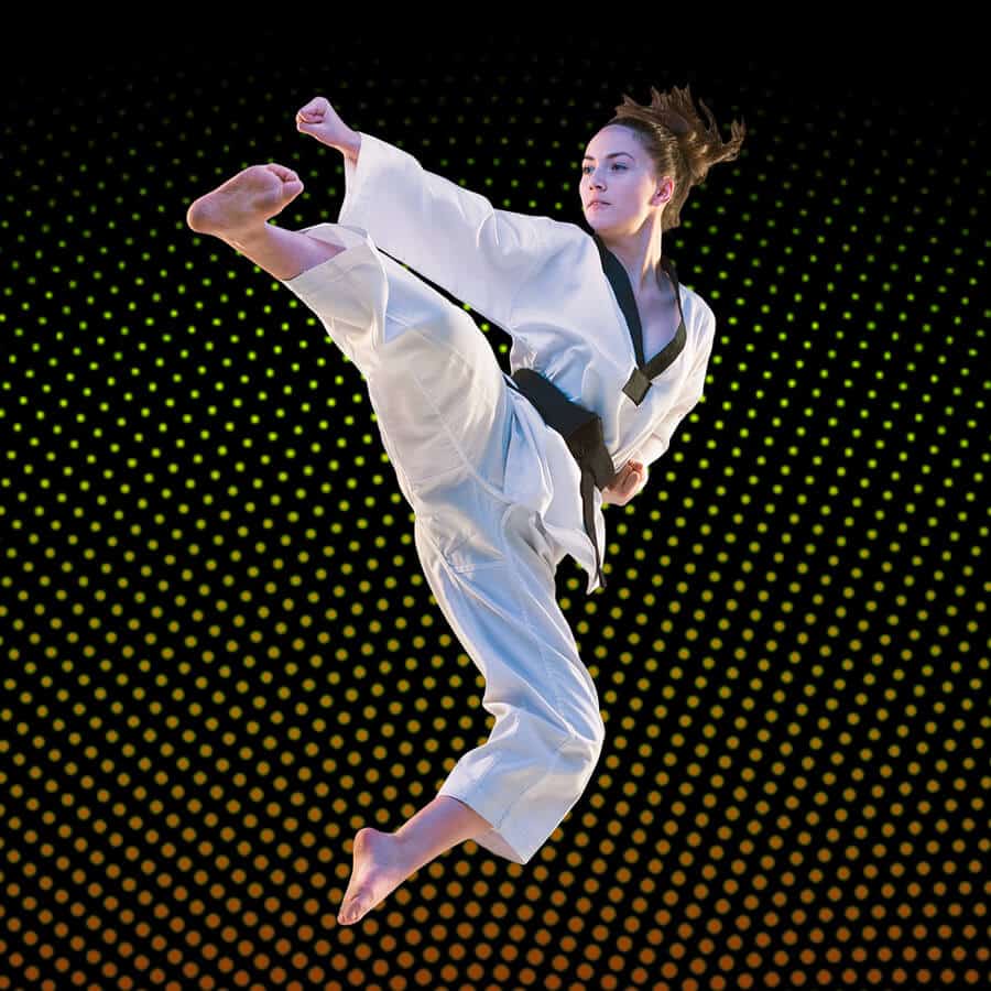 Martial Arts Lessons for Adults in Ault CO - Girl Black Belt Jumping High Kick