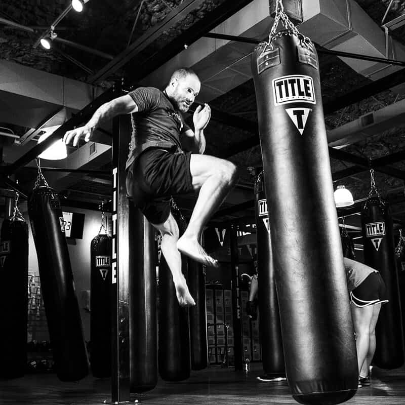 Mixed Martial Arts Lessons for Adults in Eaton CO - Flying Knee Black and White MMA